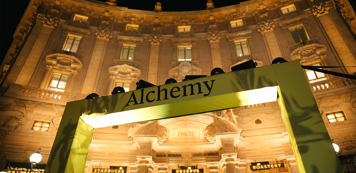 The outside entrance of the Milan Roastery with the Alchemy arc sign