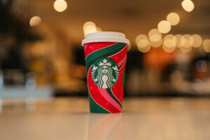 Starbucks holiday cup placed on the counter top
