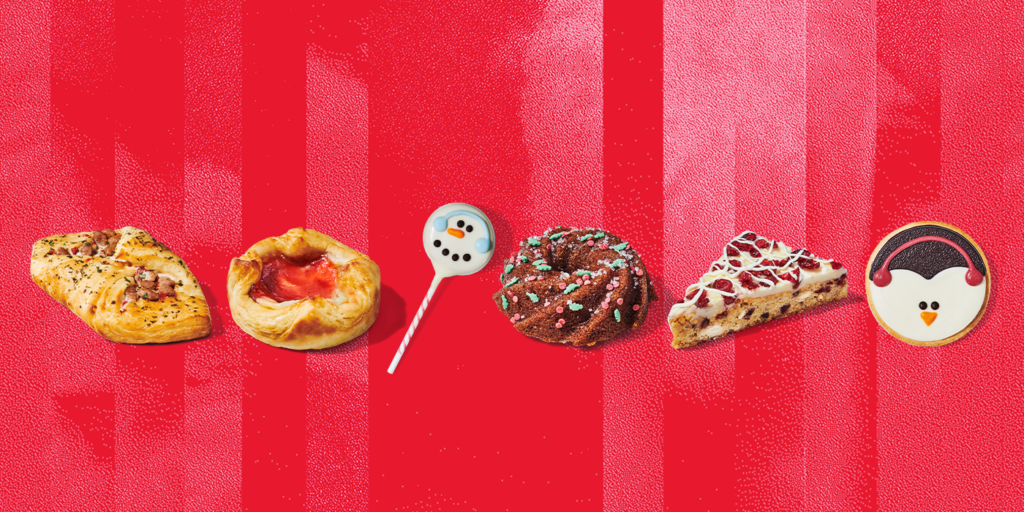An assortment of Starbucks holiday food on a red background