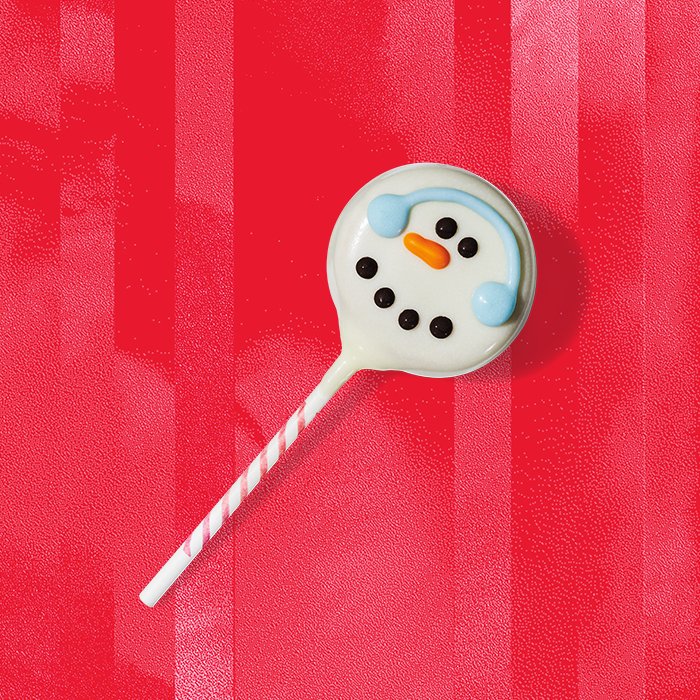 Starbucks snowman cake pop on a red background