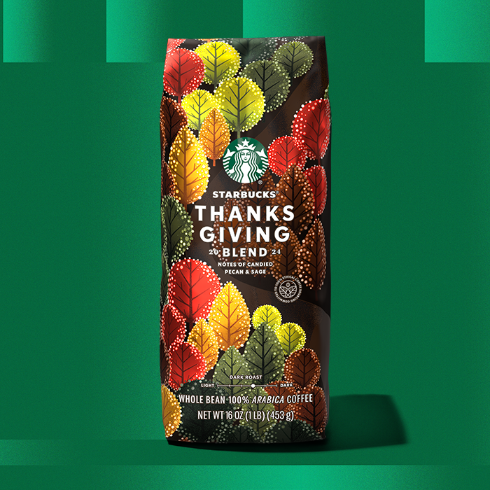 A coffee bag of Thanksgiving blend on a green background