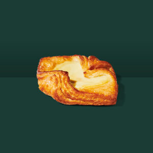 Vanilla Bean Custard Danish on a green background