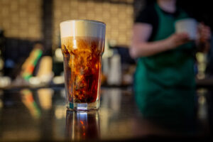 Pistachio Cream Cold Brew in a glass over the counter