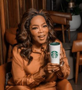 Oprah holding a Starbucks tumbler