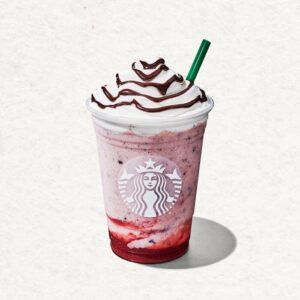 Chocolate-Covered Strawberry Crème Frappuccino with whipped cream and chocolate drizzle and a green straw