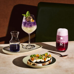 An assortment of Starbucks Reserve Butterfly Tea Spritz, Fig Walnut Ricotta Toast and Sakura Float