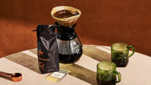 Starbucks Reserve El Salvador Montecarlos Estate Gesha Coffee next to a Chemix and two green glasses