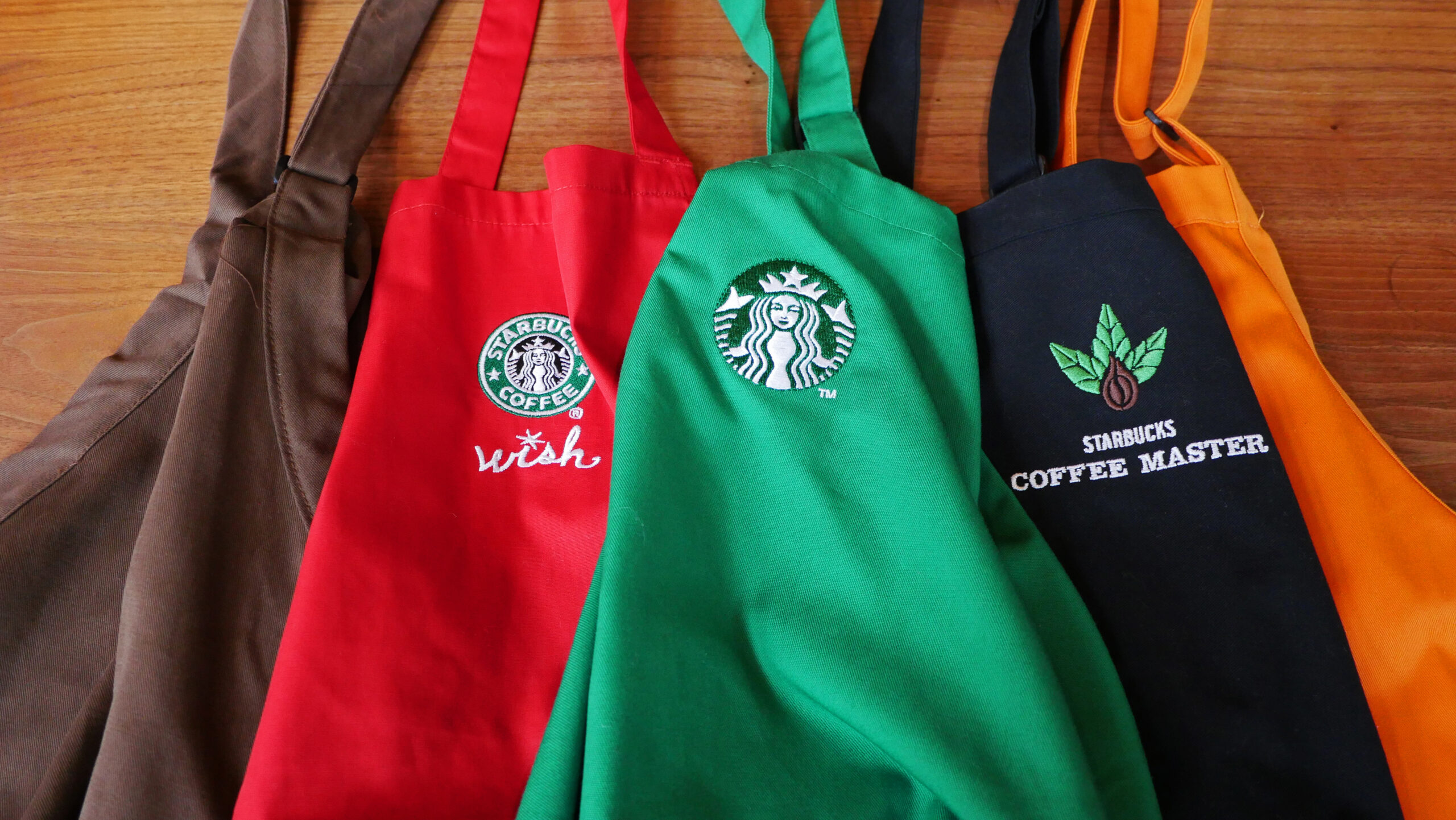 Starbucks aprons displayed.